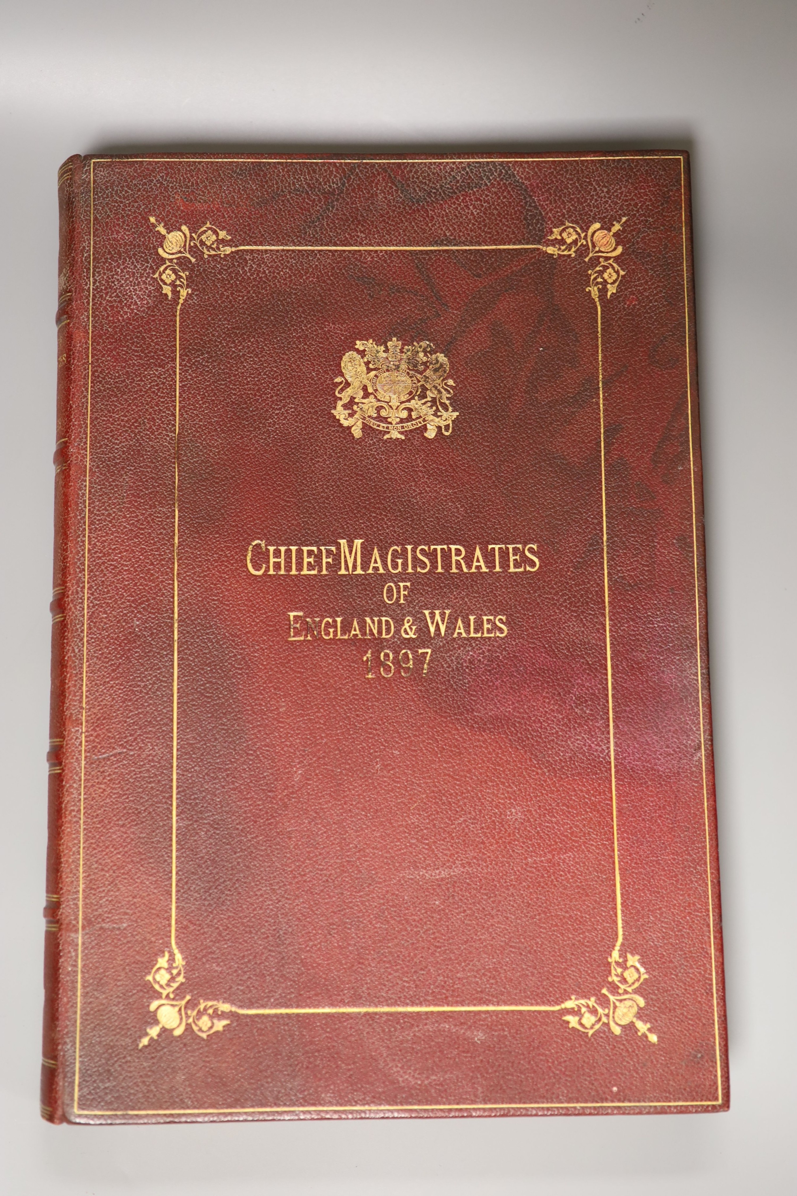 Magistrates - The Chief Magistrates of England and Wales, folio, red morocco gilt, London, 1897 and Hooper, William Eden - The Stock Exchange in the Year 1900, a souvenir, folio, vellum gilt, later plates and text spotte